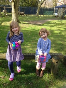Sisters Ava (5) and Iris Brett (3) are delighted with their finds at Independent Options' Easter egg hunt