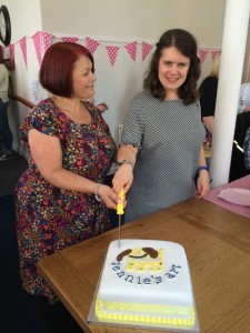 Suzie and Jennie cut the Jennie's Art celebration cake 2