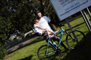 girl and man on bike 