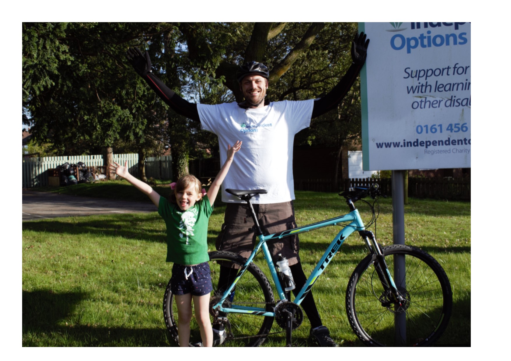 man and girl by bike